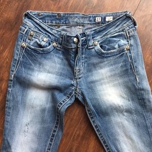 Worn in Miss Me jeans